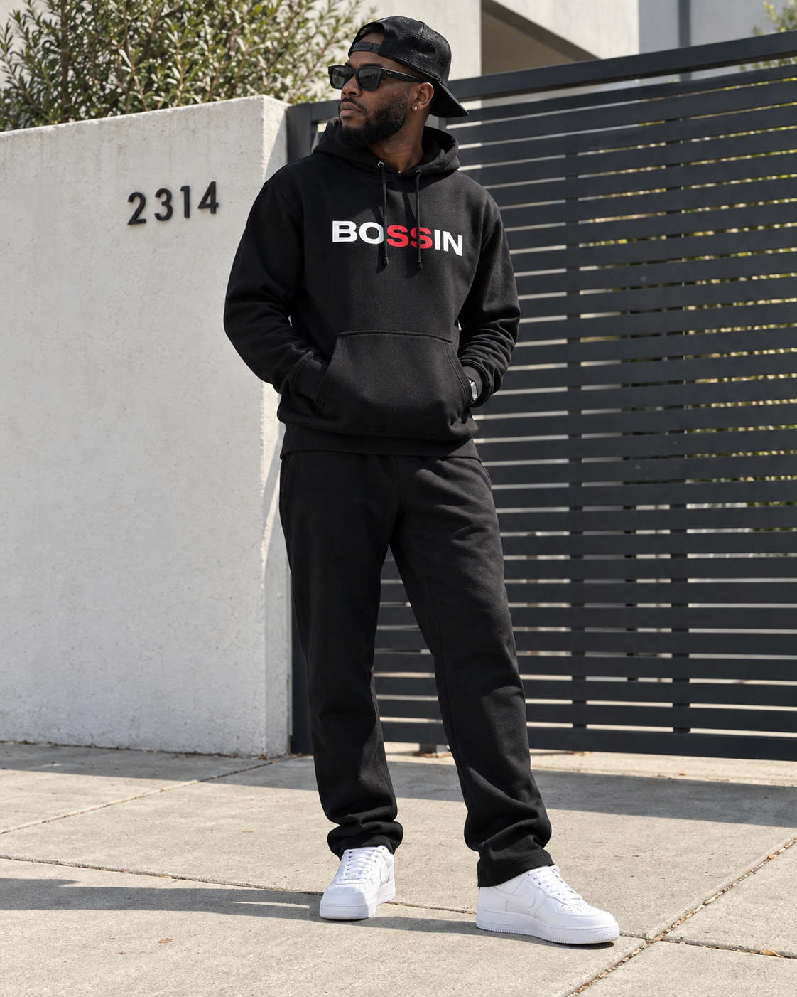 
                  
                    BOSSIN black OG hoodie lifestyle photo
                  
                